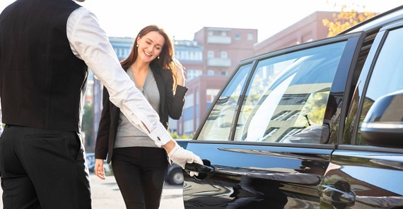 Boston Airport Car Service Driver with a sign